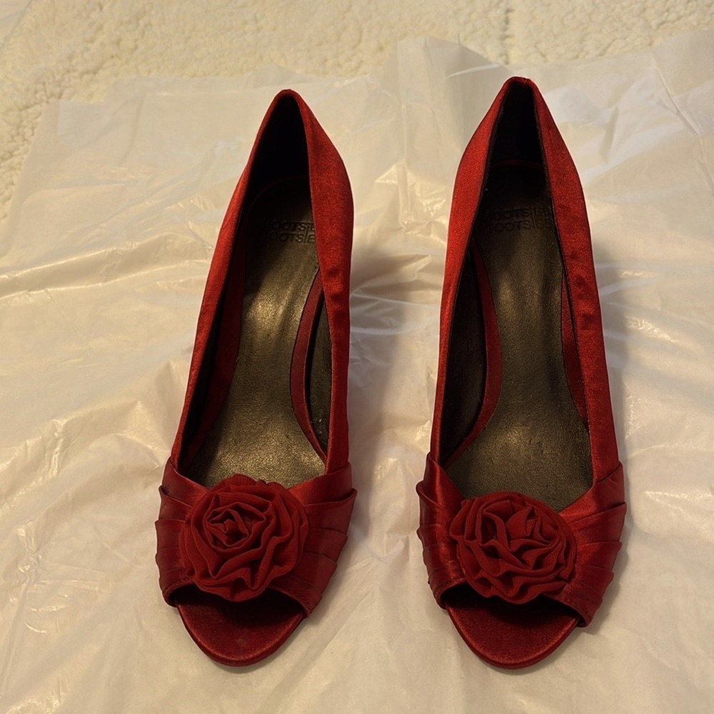 Dressy red satin heels for special occasions.
